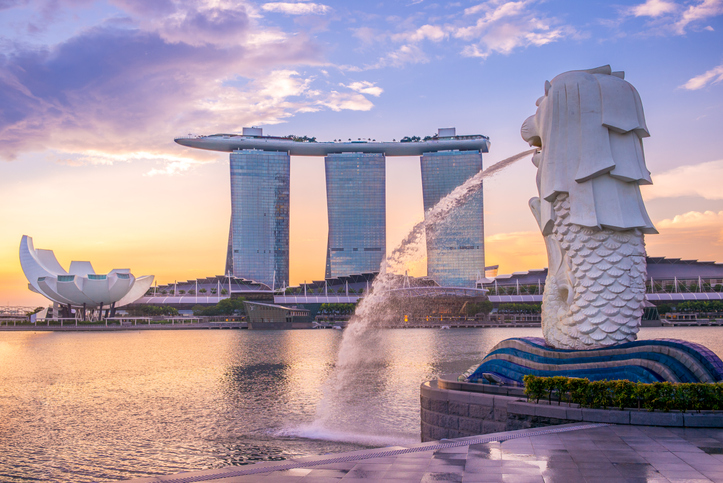 Silhouette of Merlion Statue at Marina Bay against the sunrise. Merlion is a well known marketing icon of Singapore